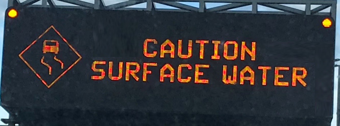 Caution Surface Water Sign