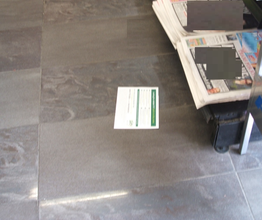Newspaper insert on floor
