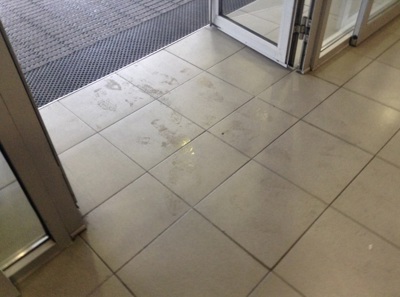 Wet footprints at entrance